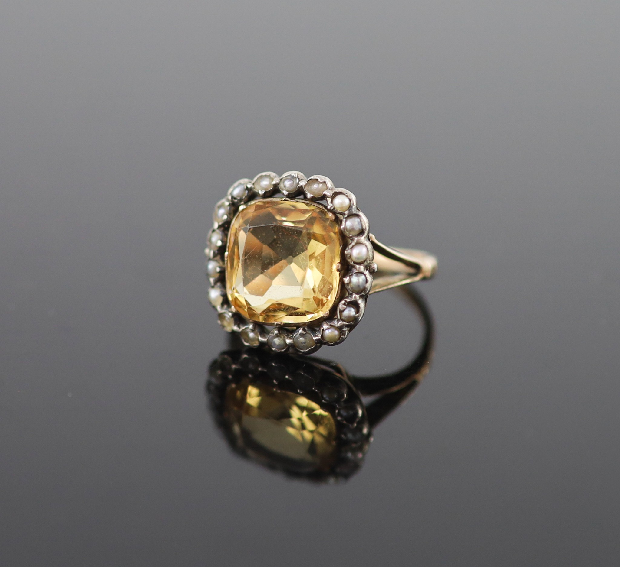 A 19th century gold, citrine and seed pearl set shaped square cluster ring